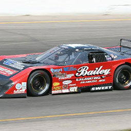 A racecar sponsored by Sweet Manufacturing, Inc. at Berlin Raceway in 2002.