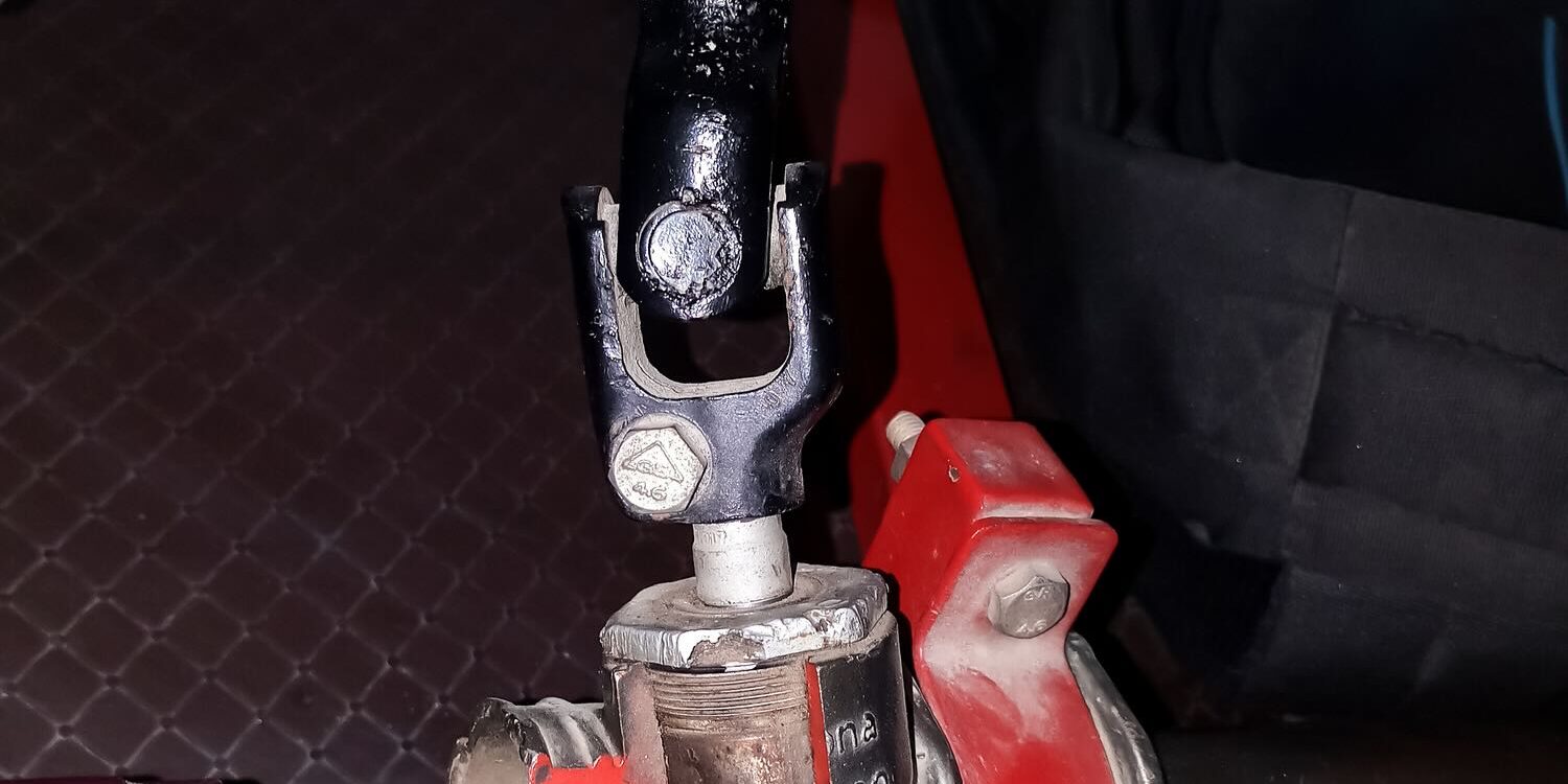 Close-up of a rack and pinion steering mechanism.