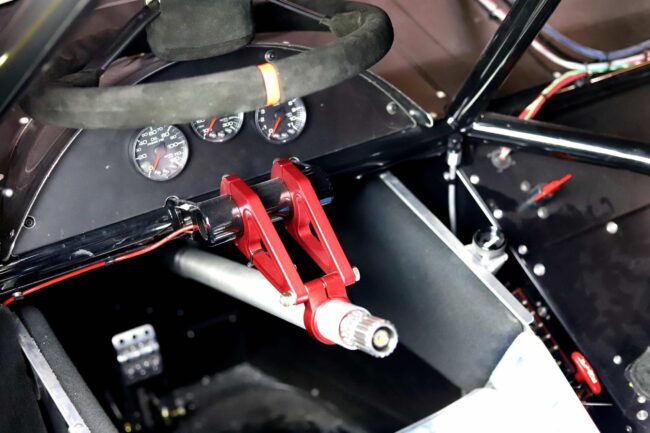 Sweet Manufacturing Types of Steering Wheels Photo 1 Photo of a Sweet Manufacturing quick-release steering wheel in a race car.